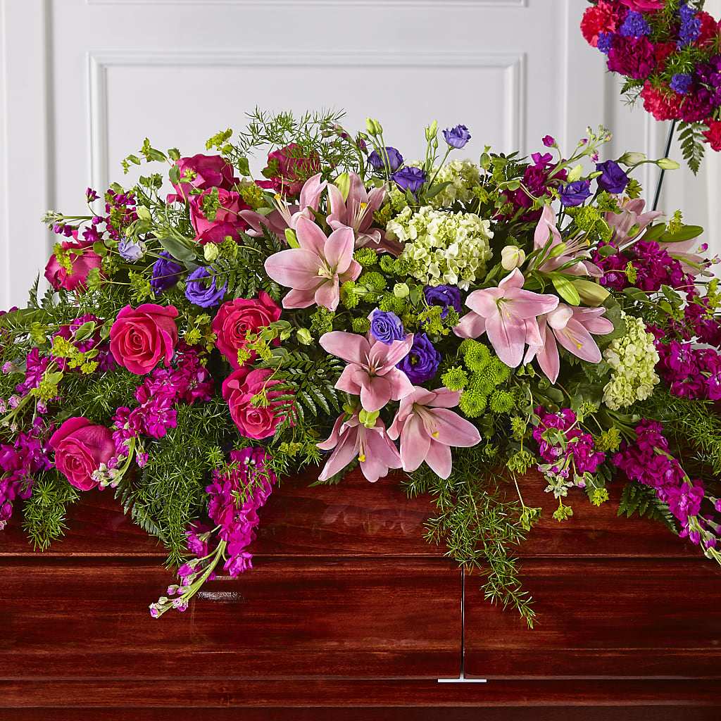 Radiant Tribute Casket Spray – BLOOMERS FLOWERS & GIFTS, Campbell CA